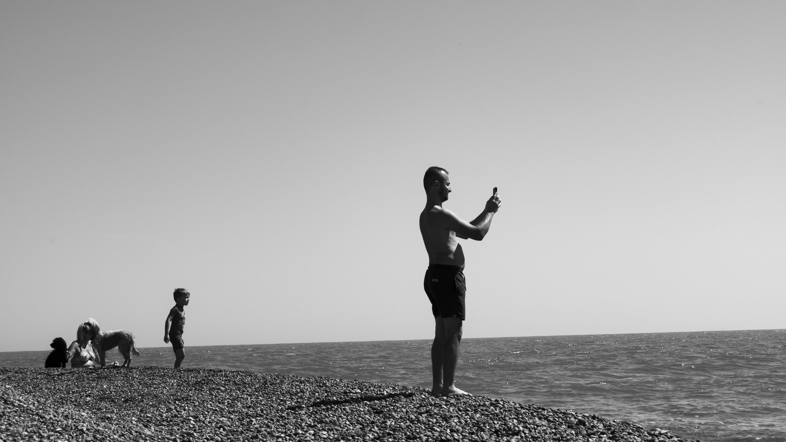 Shingle Beach Suffolk - Man Taking Photo - 13.08.jpg