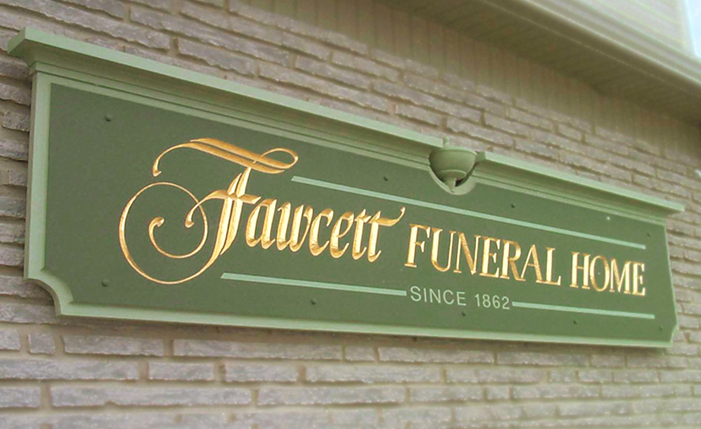 A funeral sign designed in traditional lettering and format, authentic to the mid-1800s when the funeral home was established.