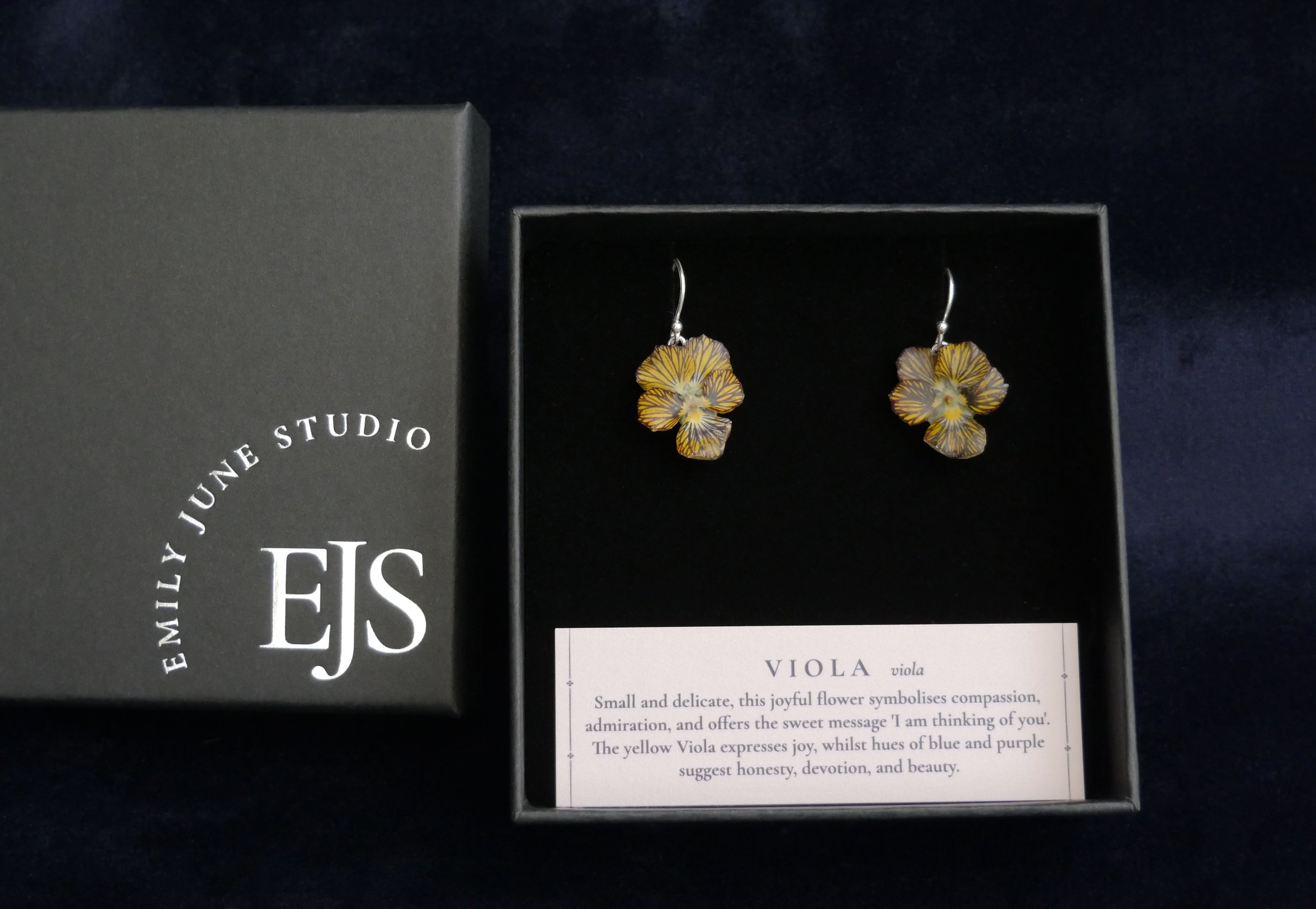 yellow viola earrings in box .jpg