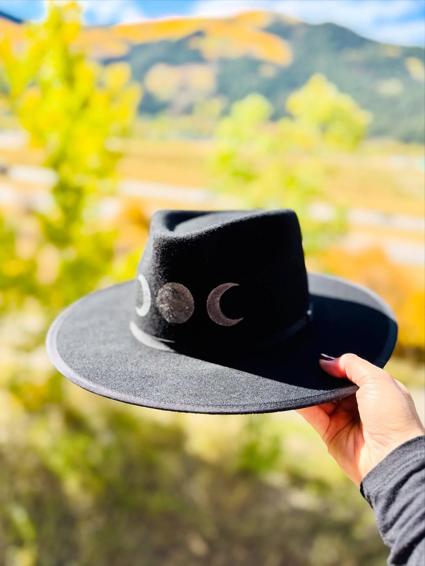 &mdash;&mdash;&mdash;
M O O N  D A N C E 🌙 
&mdash;&mdash;&mdash;
This one&rsquo;s for the night wanderers&mdash;hand-painted with a lunar cycle on the crown and a howling wolf on the back. A stiff black wool felt rancher built to move with you from