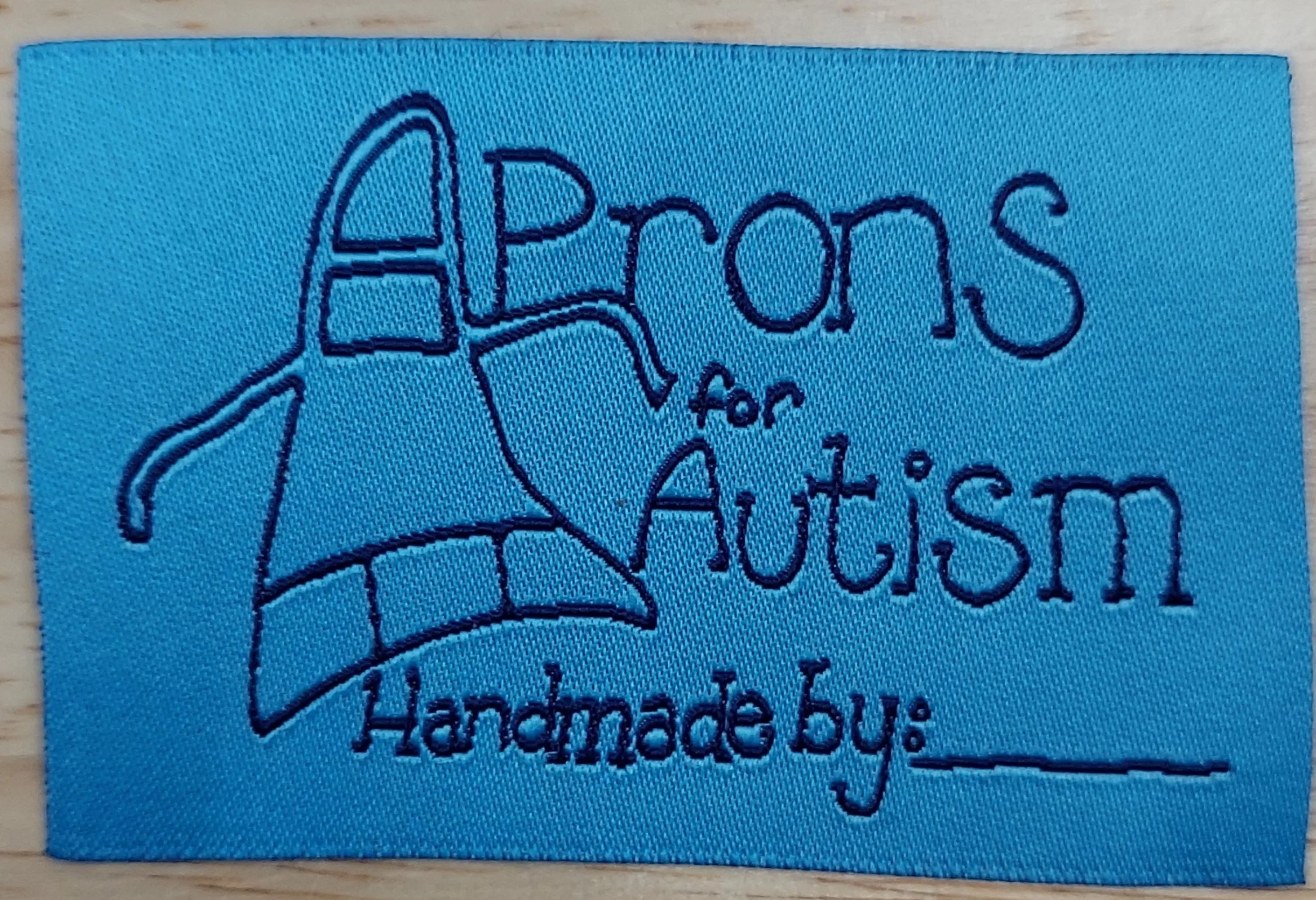 Aprons for Autism Label — Quilt Culture