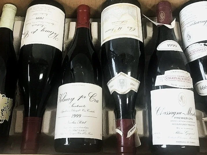Bottles of Volnay and Chassagne-Montrachet, beautiful Burgundy wines