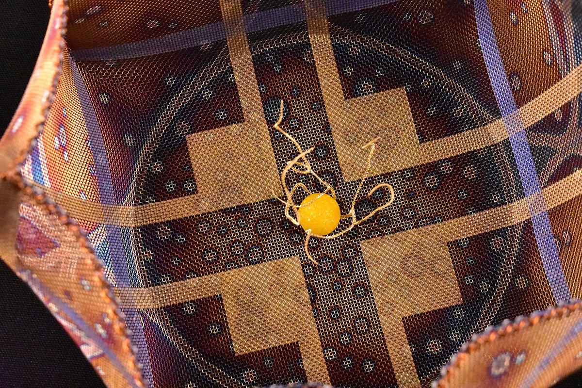 Vessel of Golden Dreams (detail), Stainless steel mesh, wire, acrylic medium, glass frit, H7 x W9 x D9.5, $1,400