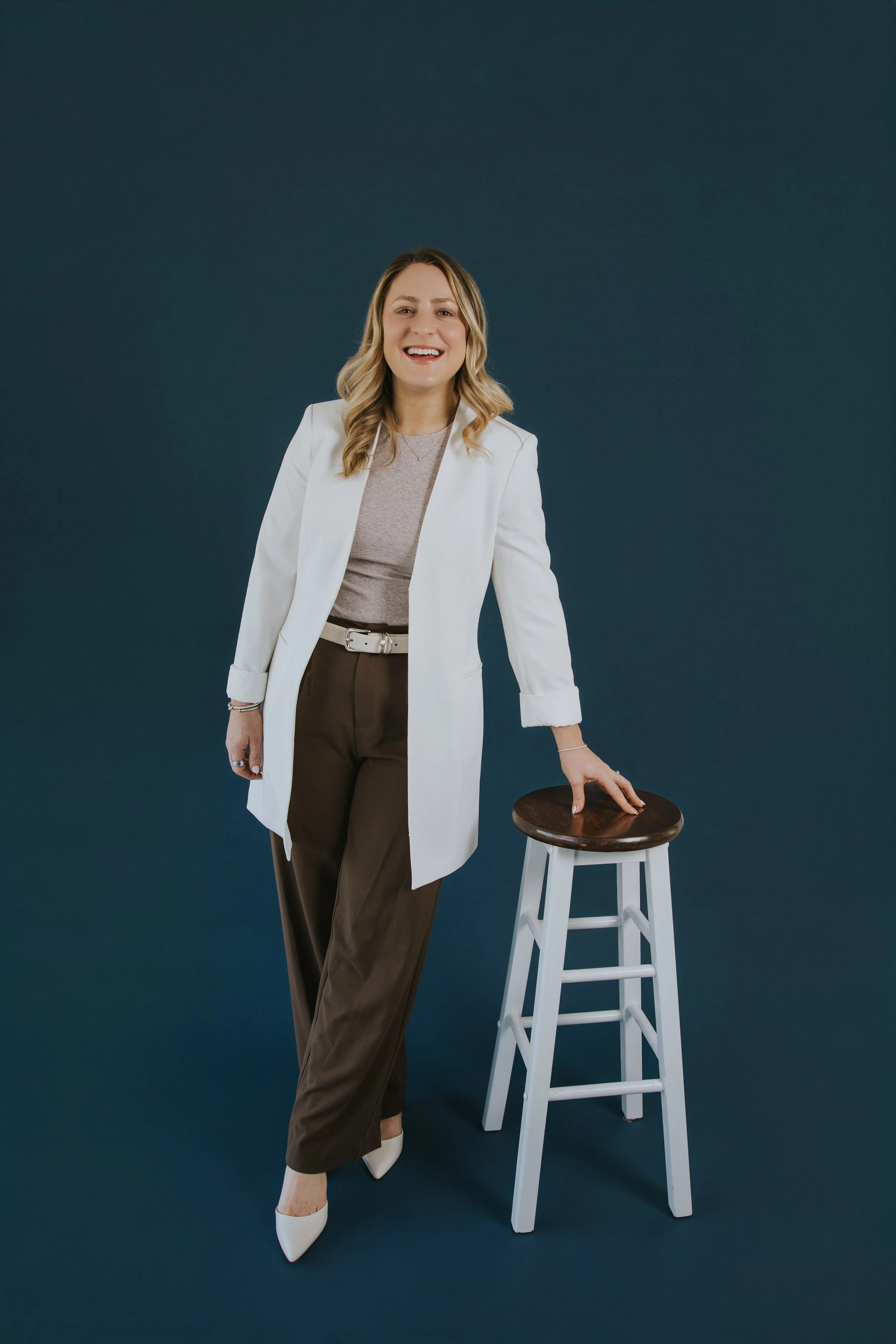 Kylie Lambert, therapist specializing in anxious attachment, standing portrait