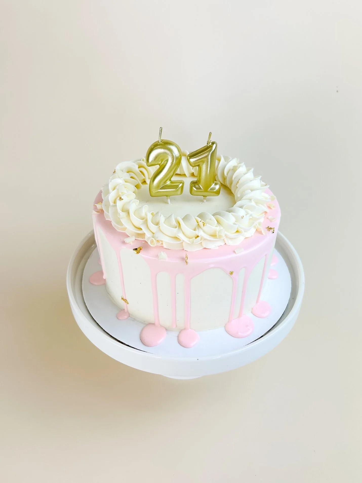 Elevated Pink Champagne Cake with number candles.JPG