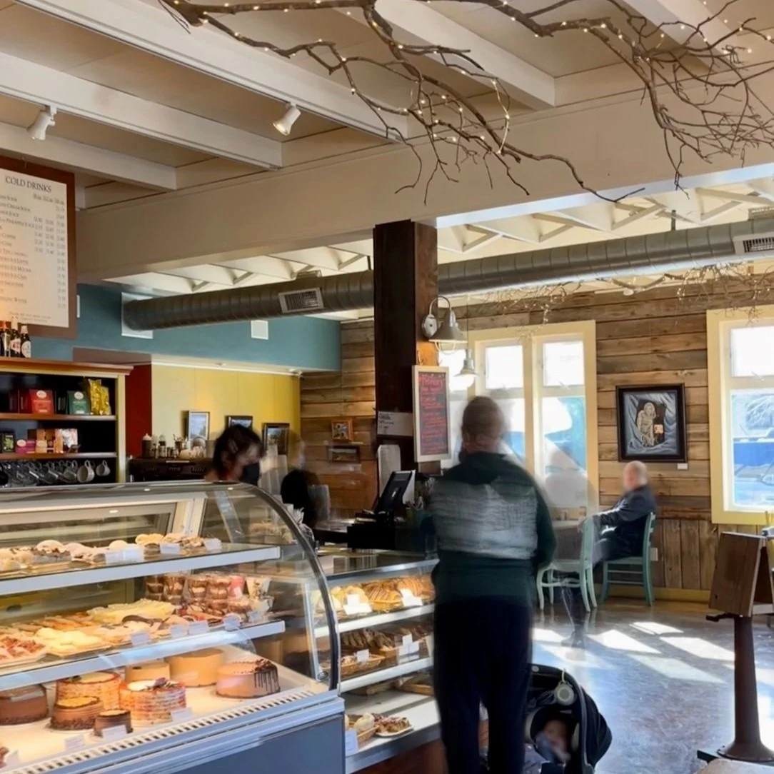 Interior cozy cafe with light shining through windows