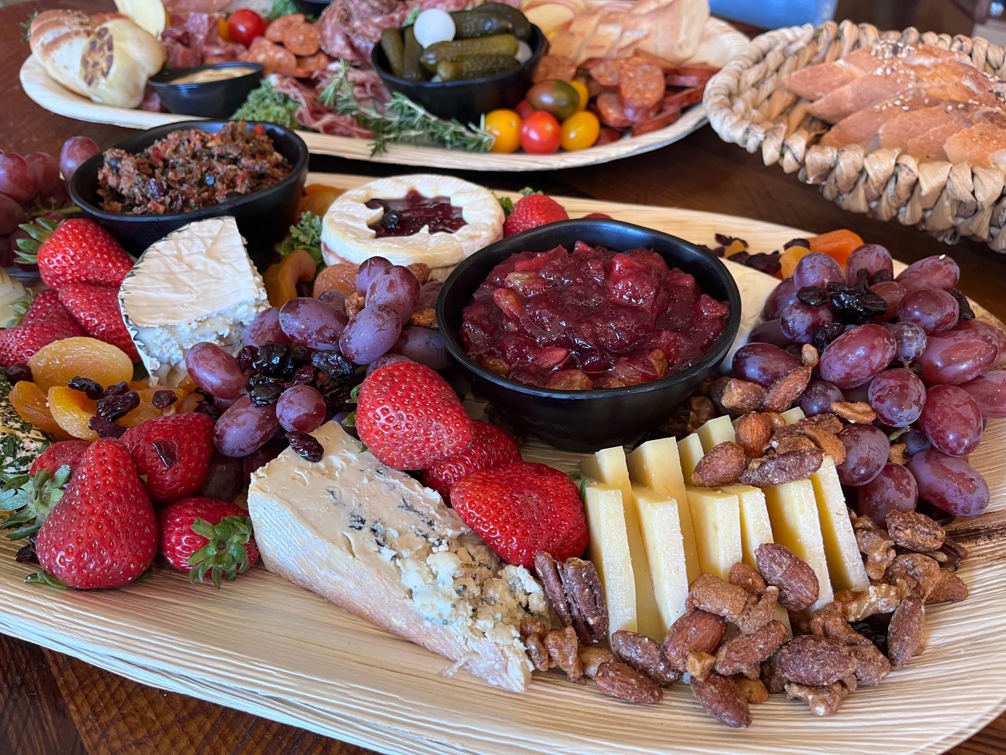 grazing board with cheeses and fruits