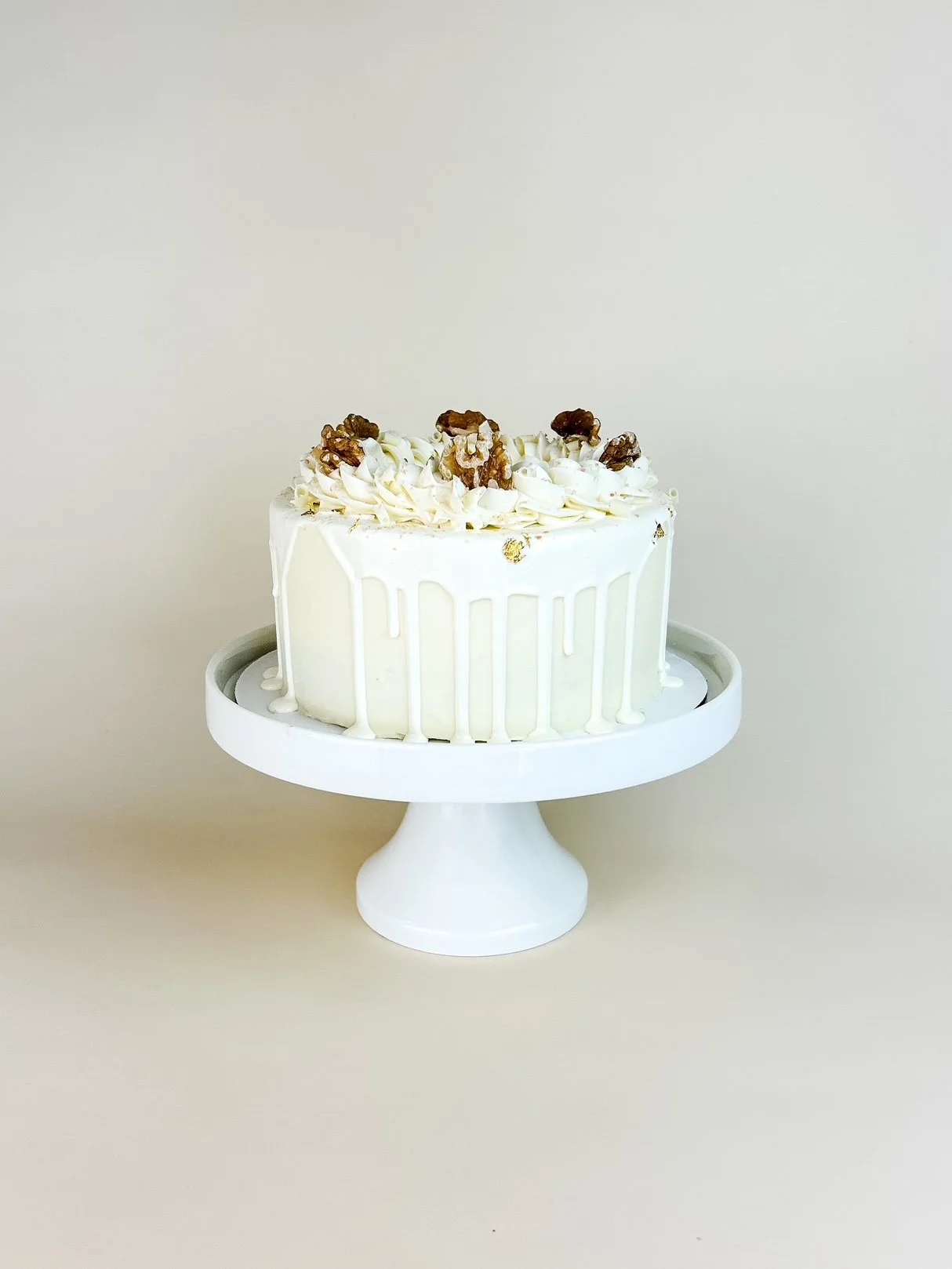 Elevated Carrot Cake on white cake stand