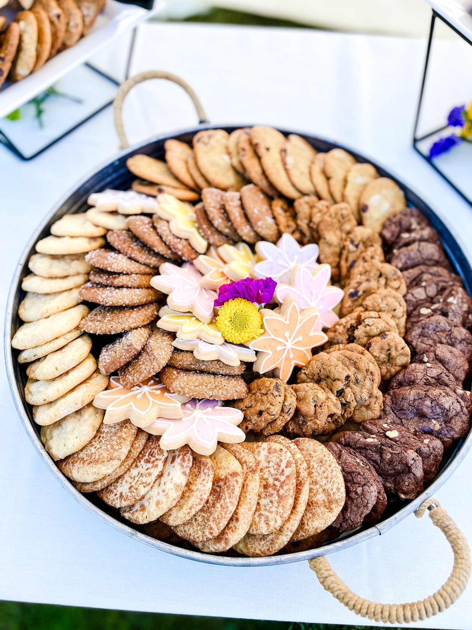 A round tray filled with assorted cookies