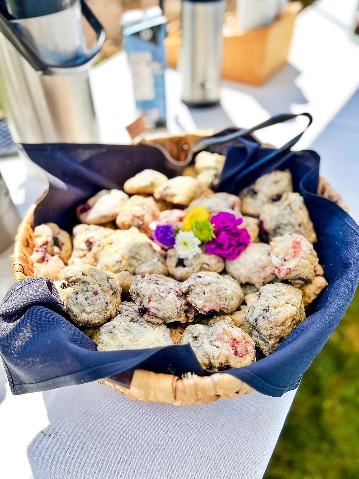 A wicker basket filled with blueberry scones