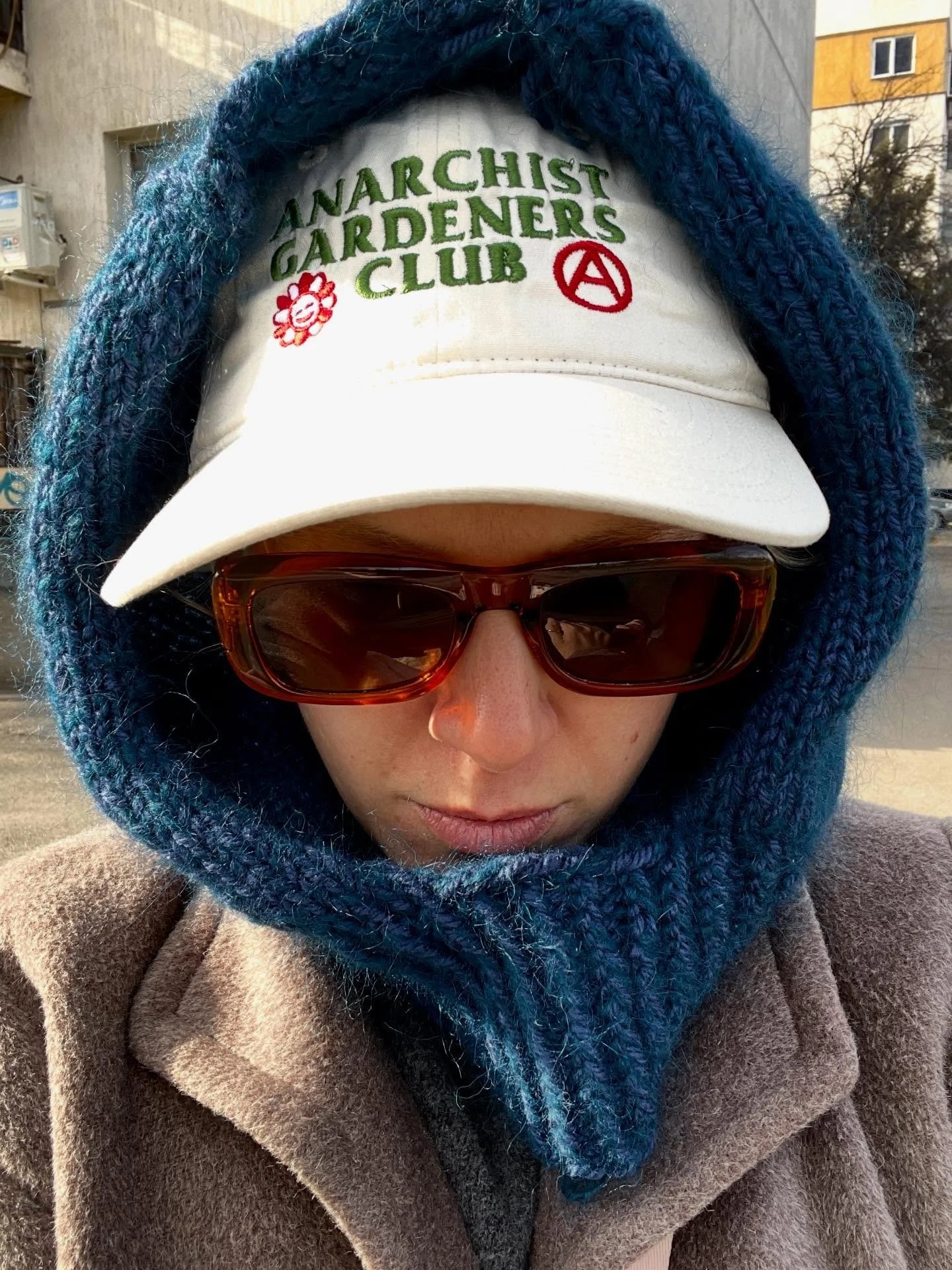 After a week of hibernation, a goblin&rsquo;s first walk outside with its long-awaited hat @blacklodgepress , a sweet gift from the bff @kristinne.x and a diy knit project 
.
.
.
#blacklodgepress #anarchistgardenersclub #knitting
