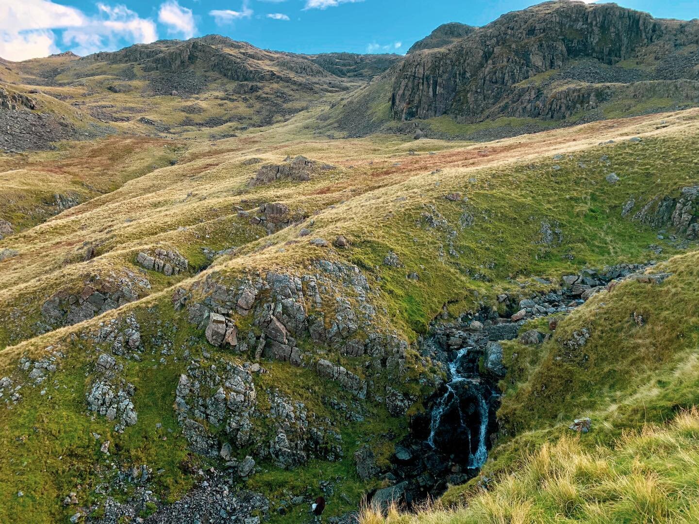 Scafell Pike is the tallest mountain in England and one of three prominent peaks in the UK. 

A peak for each country, these mountains stand the tallest for their nation- the other two are Ben Nevis in Scotland and Mt. Snowdon in Wales. 

These three