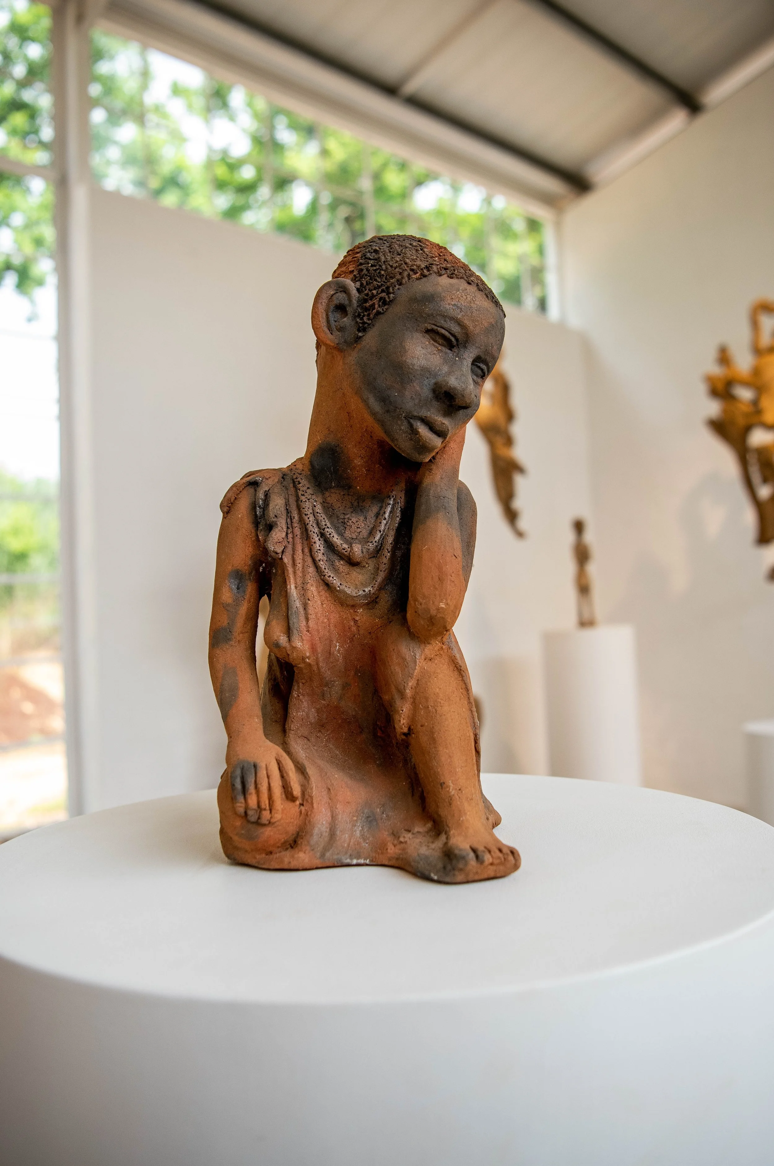 Installation view of 'Noria Mabasa: Shaping Dreams,' 2022. Villa-Legodi Centre for Sculpture at NIROX Scuplture Park. Photo: Lucky Lekalakala. Image courtesy of the artist, the Centre, and !KAURU Contemporary Art from Africa_2453.jpg