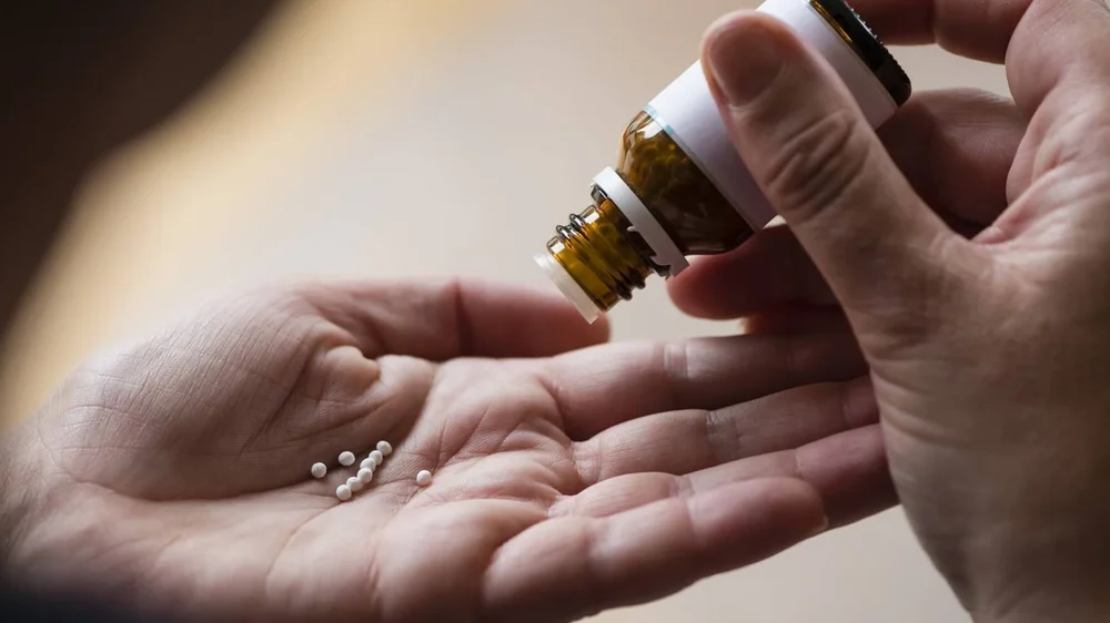 Homeopathic remedies in the hand