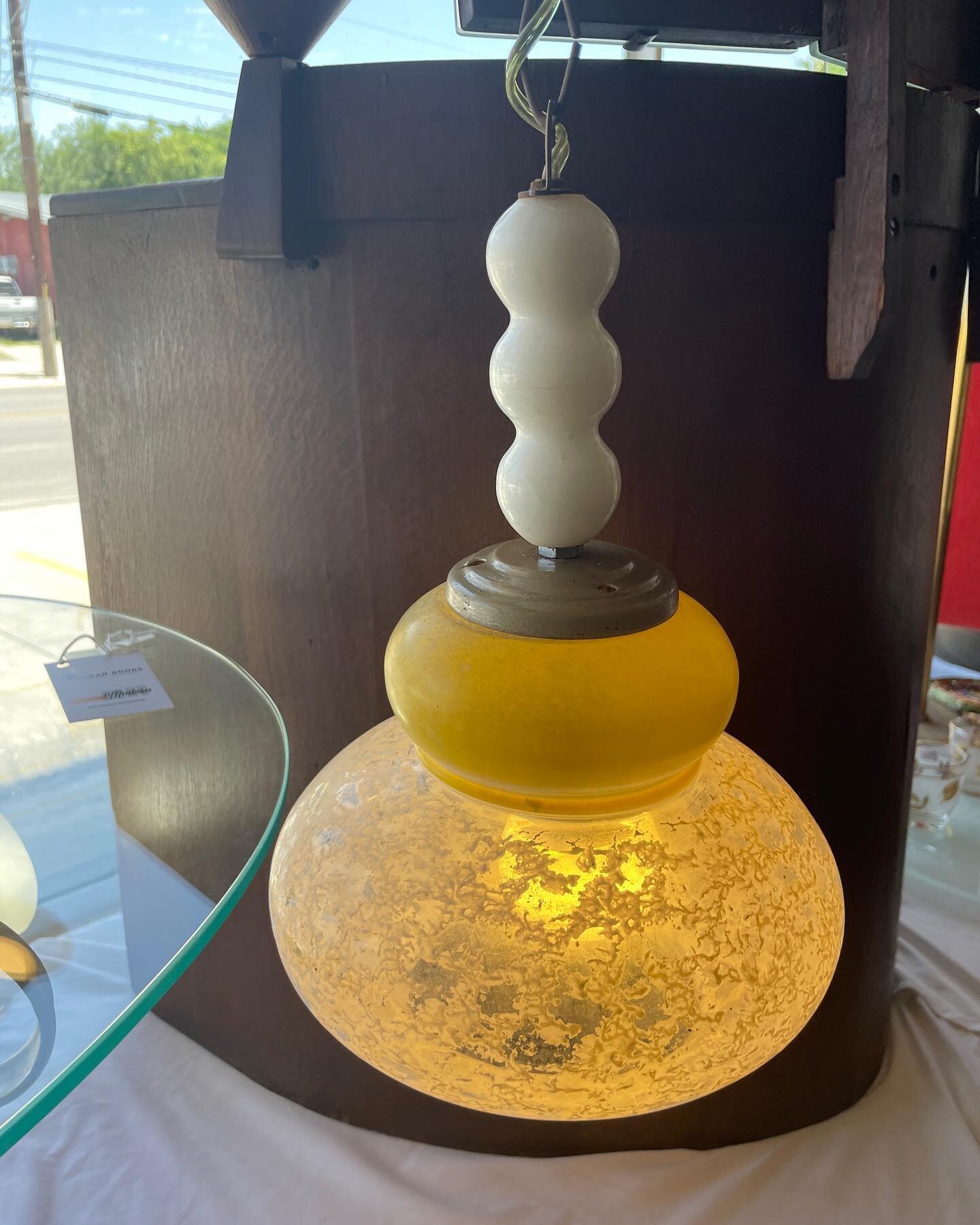 Charming white and yellow glass light fixture with textured globe. (13&rdquo;ht)
(Professionally rewired)