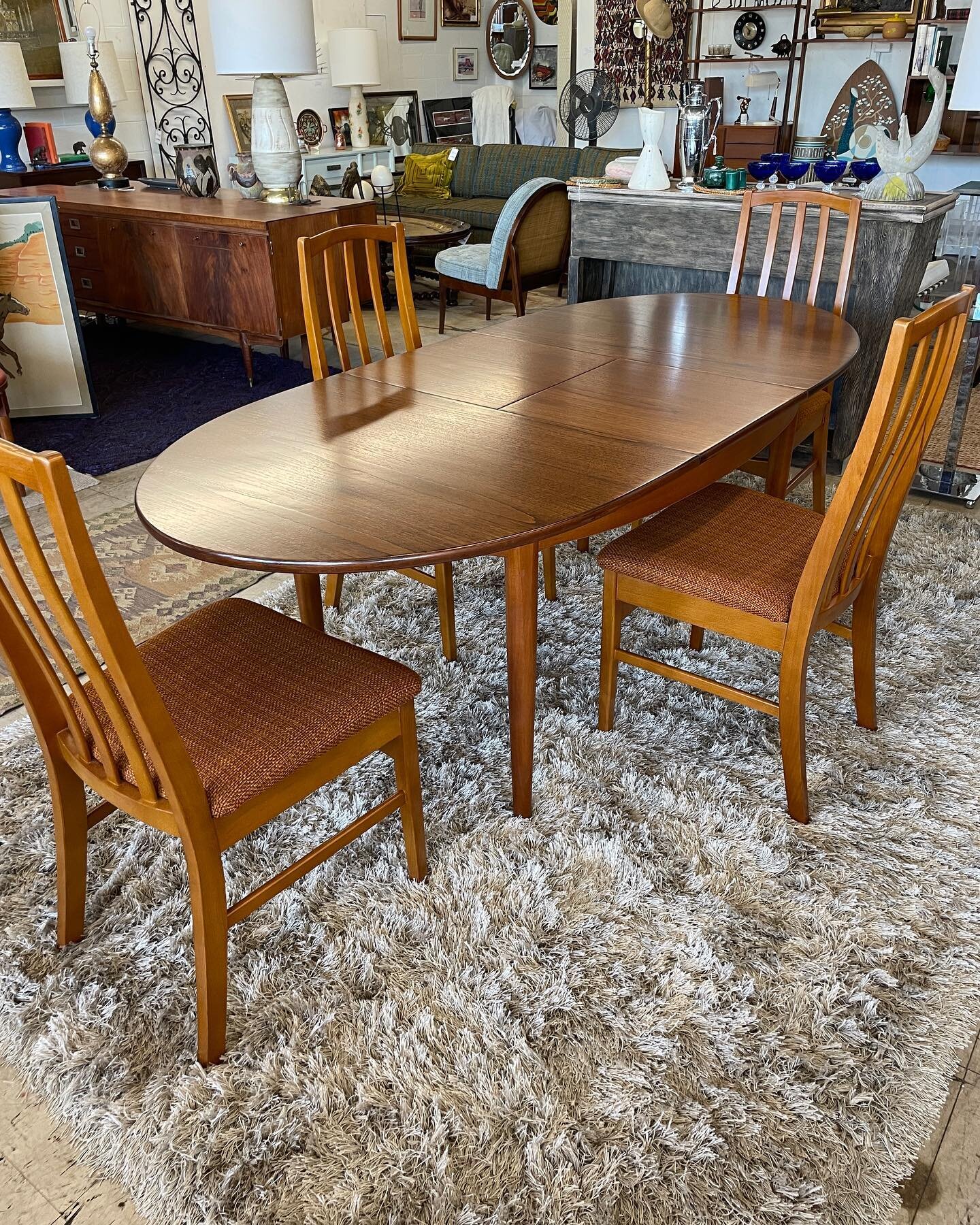 Unusual narrower oval teak dining table &amp; (4) chairs. 
Table top has been professionally refinished.
Table has center butterfly leaf.
Table extends (60-78&rdquo;l. X 36&rdquo;w. X 30&rdquo;)
