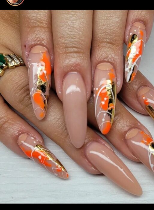 Rounded acrylic nails with nail art