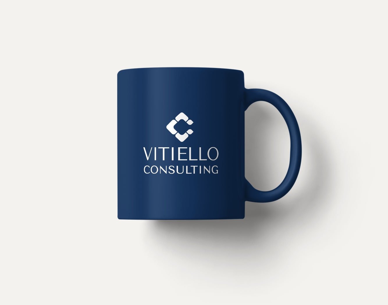 dark-blue-mug-with-abstract-corporate-logo-on-it.jpeg