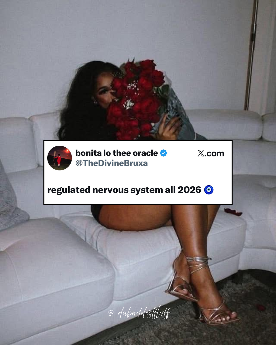 Person seated on a white couch holding red roses, dressed in black with heels. Overlaid tweet reads “regulated nervous system all 2026 🧿,” evoking themes of softness, wellness, and luxury.