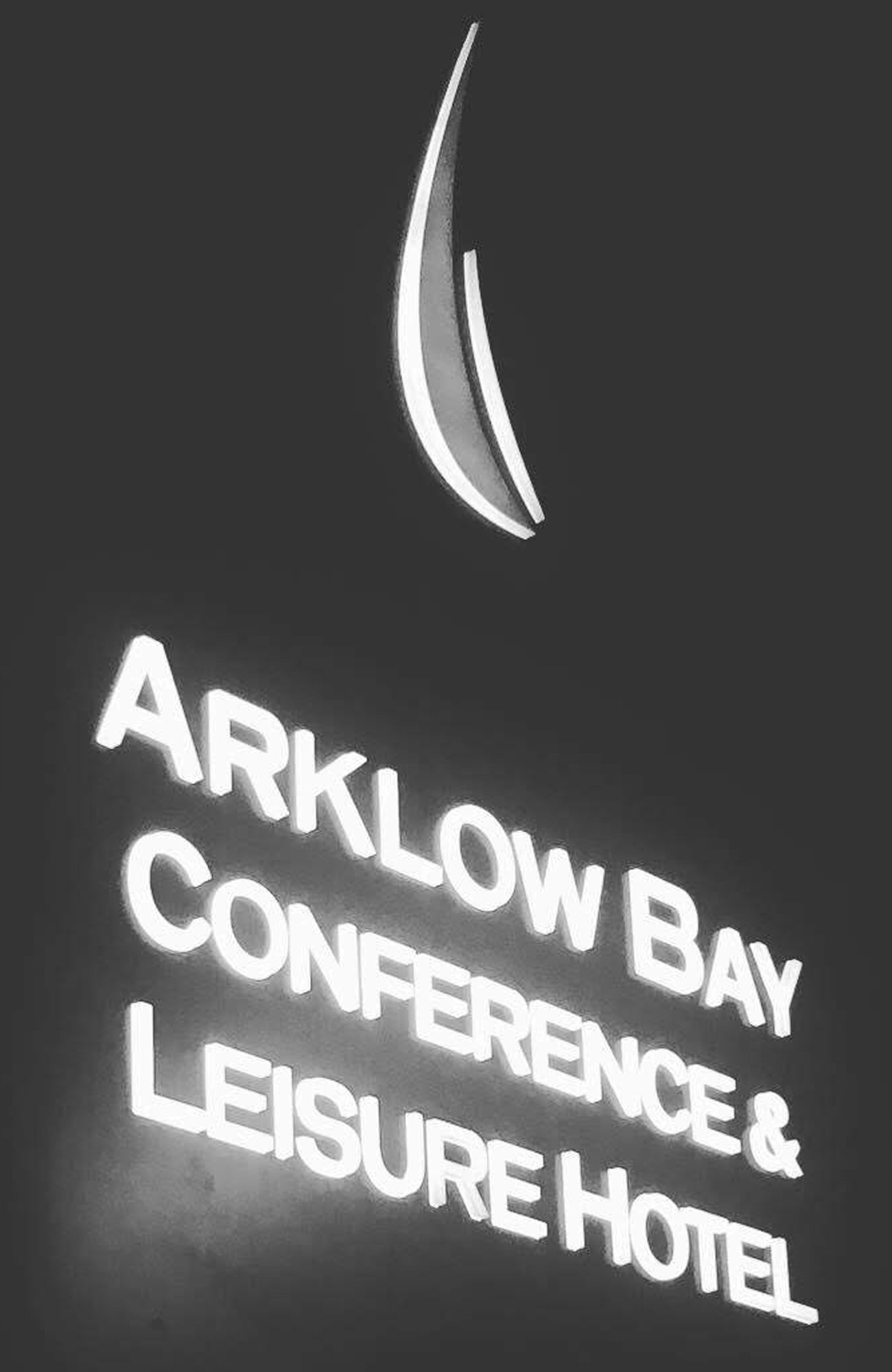 Illuminated push through type lettering and logo installed on freestanding sign at a Hotel. Installation by Barrow Signs Limited