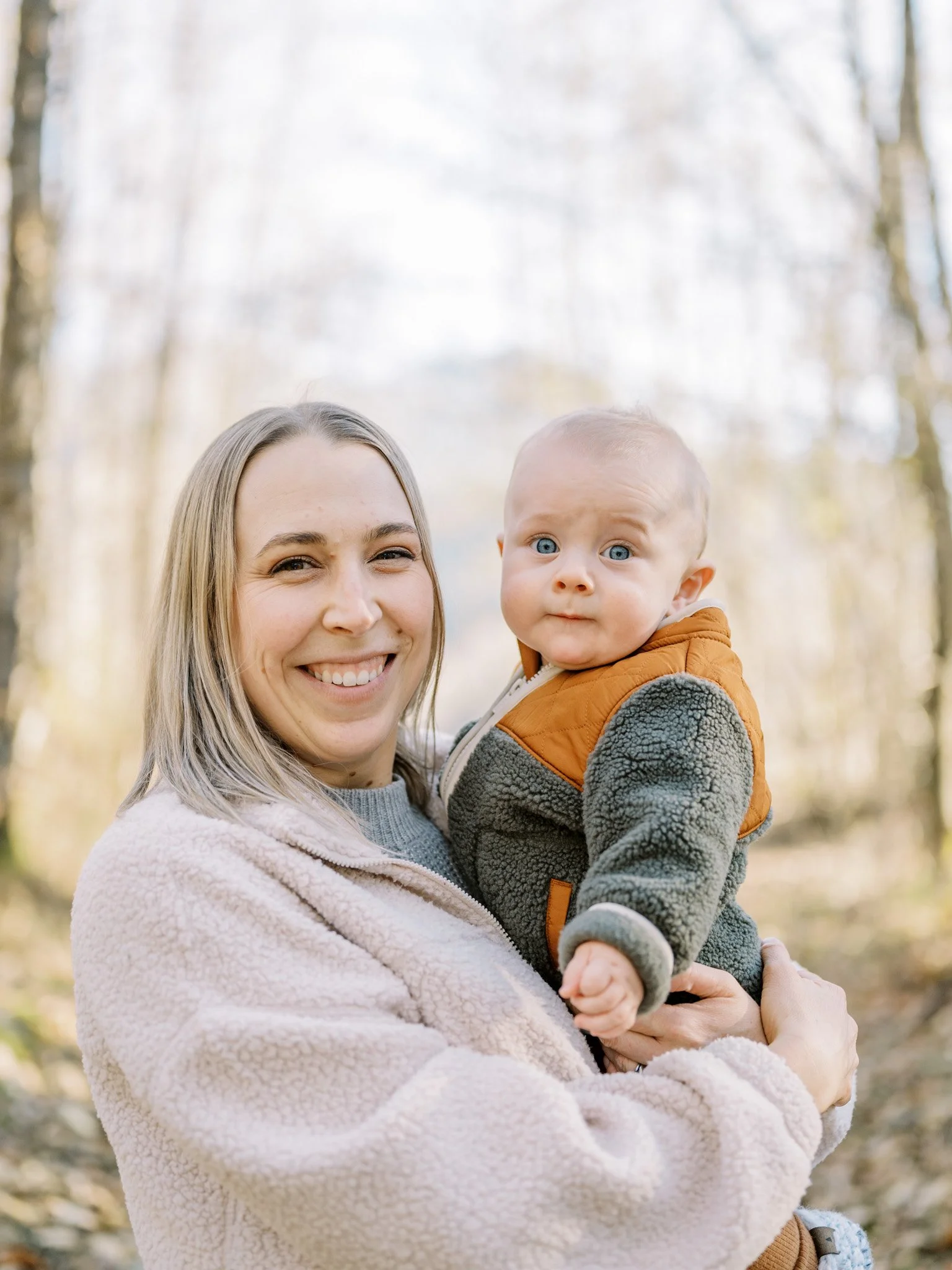 mother and baby looking at camera