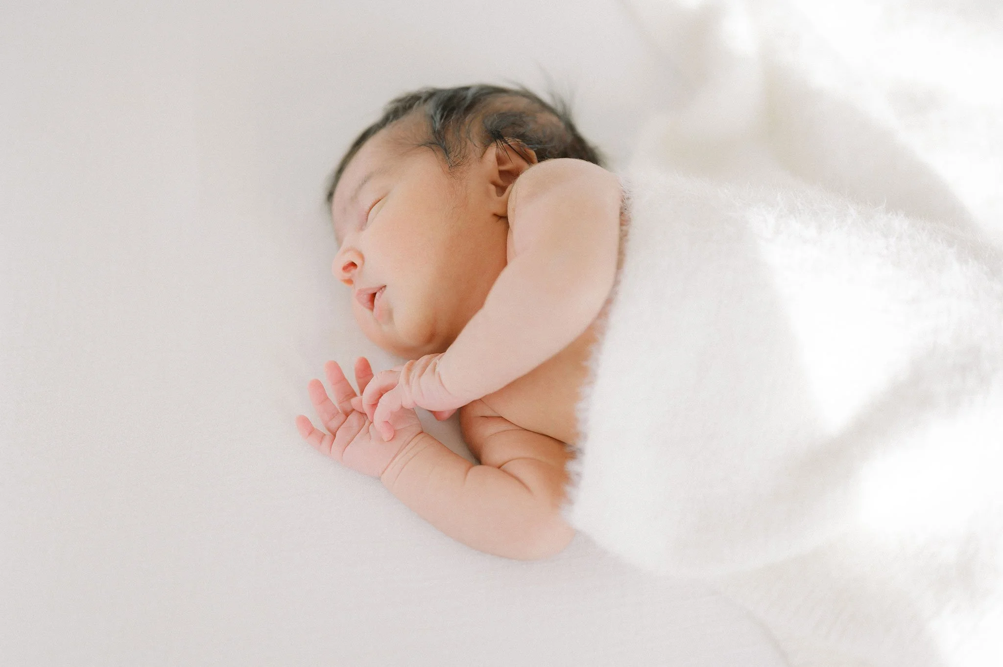 sleeping newborn baby
