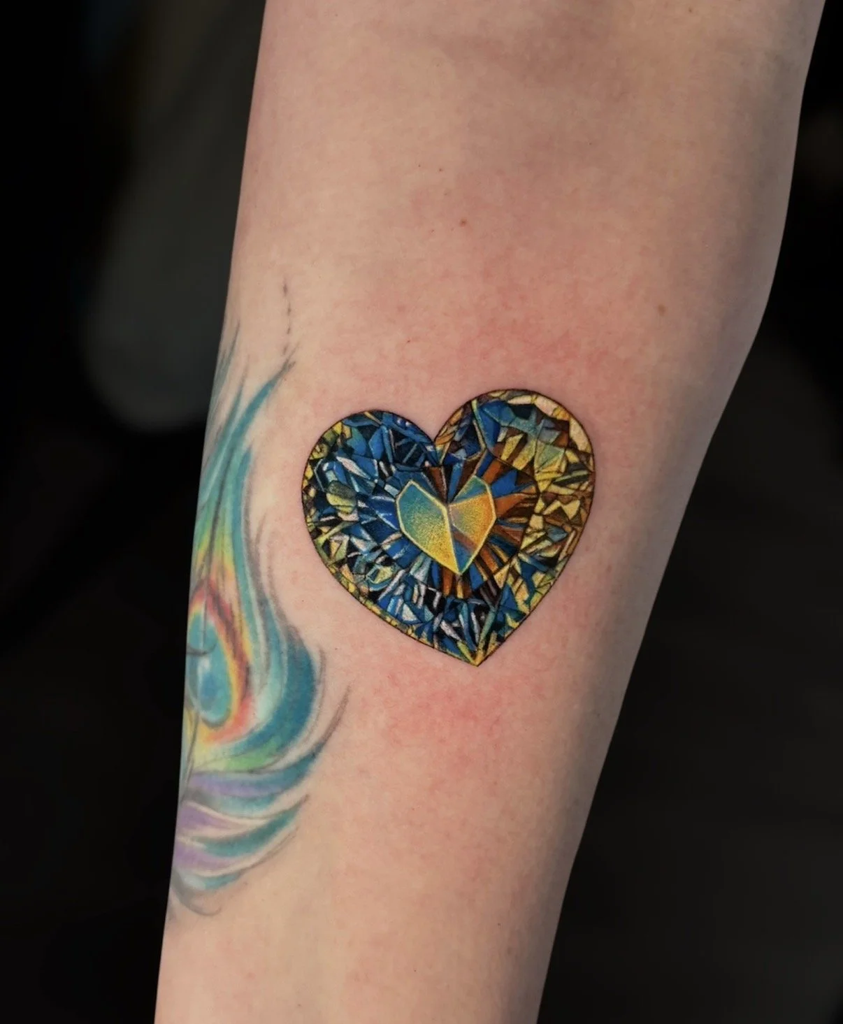 Blue and gold mosaic heart tattoo, by Chris Kennedy.