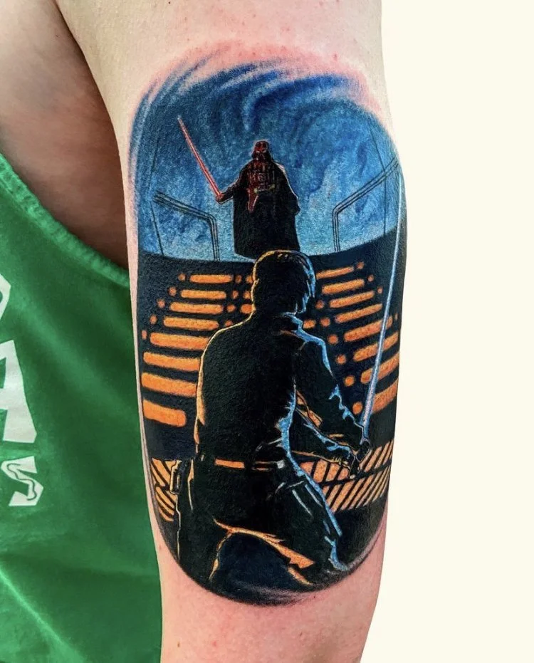 Colour tattoo of a dramatic science-fiction duel, with blue and orange light, by Chris Kennedy.