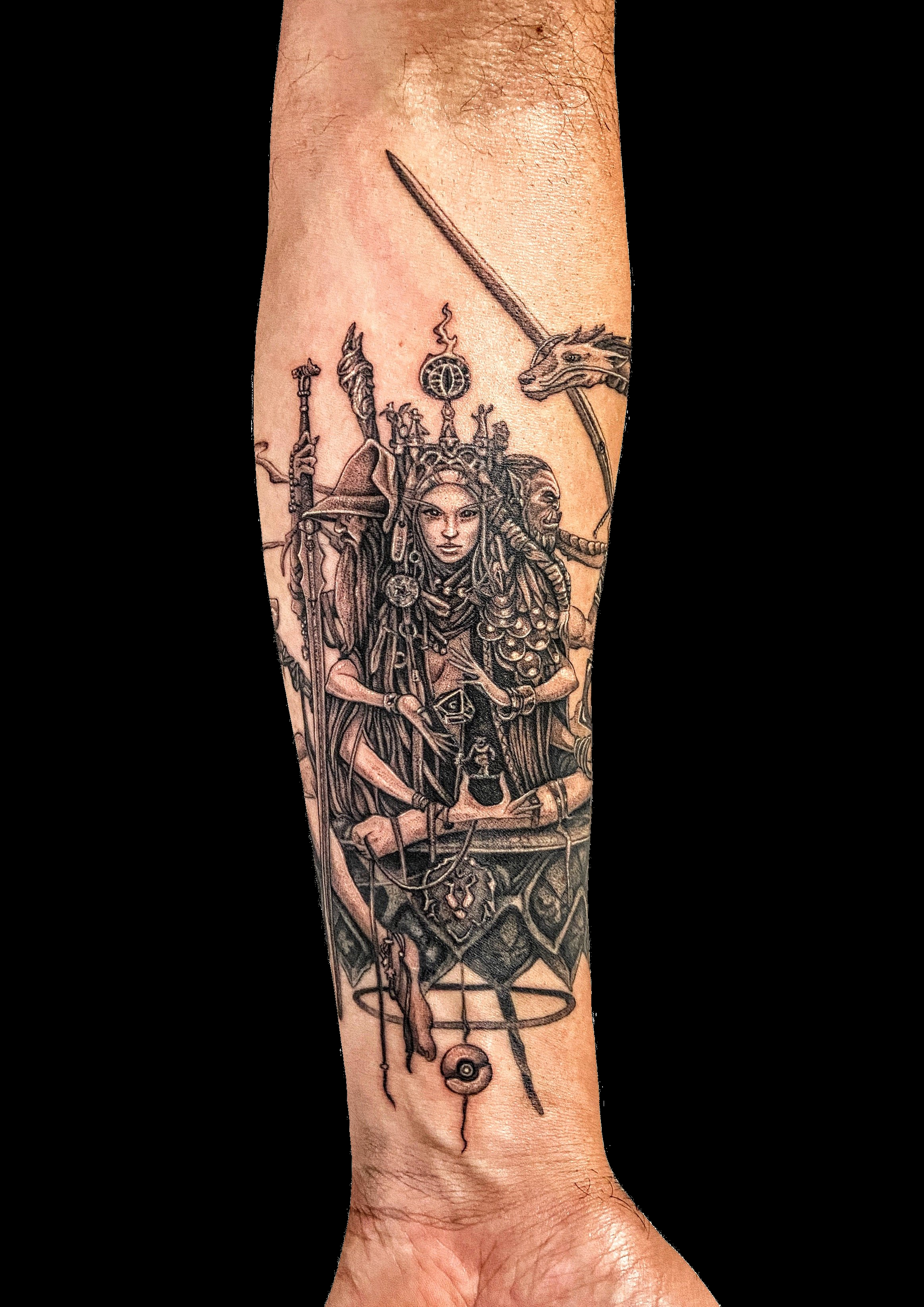 Ornate black and grey figure tattoo with decorative framing.
