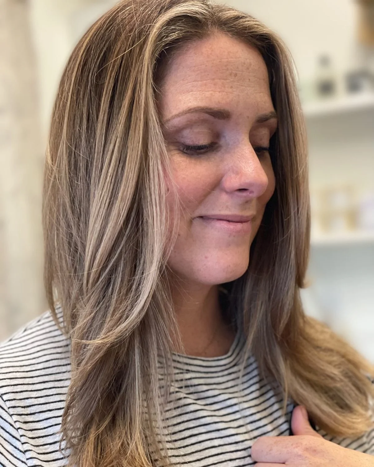 Dimensional balayage color with soft face-framing highlights at Zen Den Salon in Encinitas.