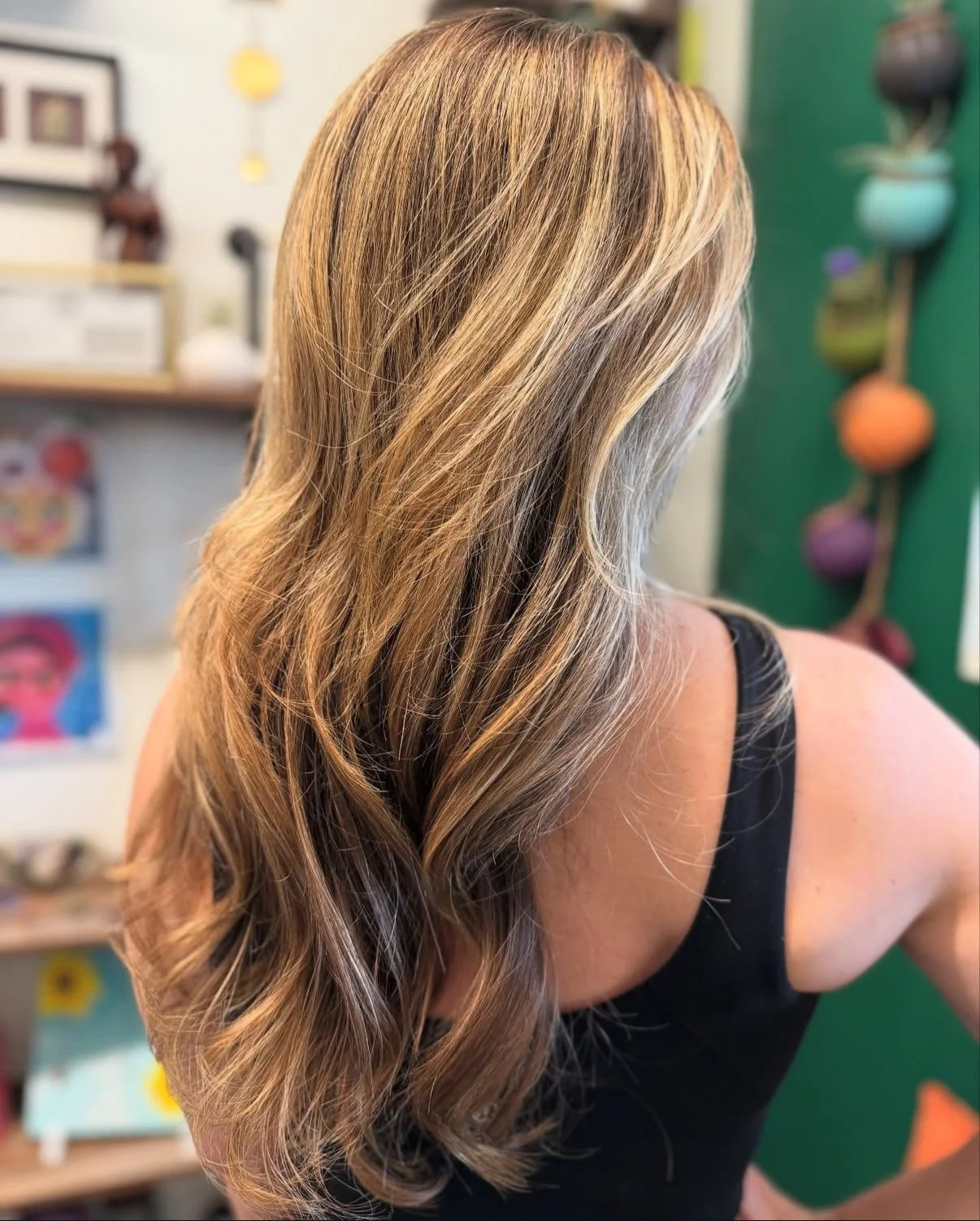 Bright, blended partial highlights for a soft glow that grows out beautifully