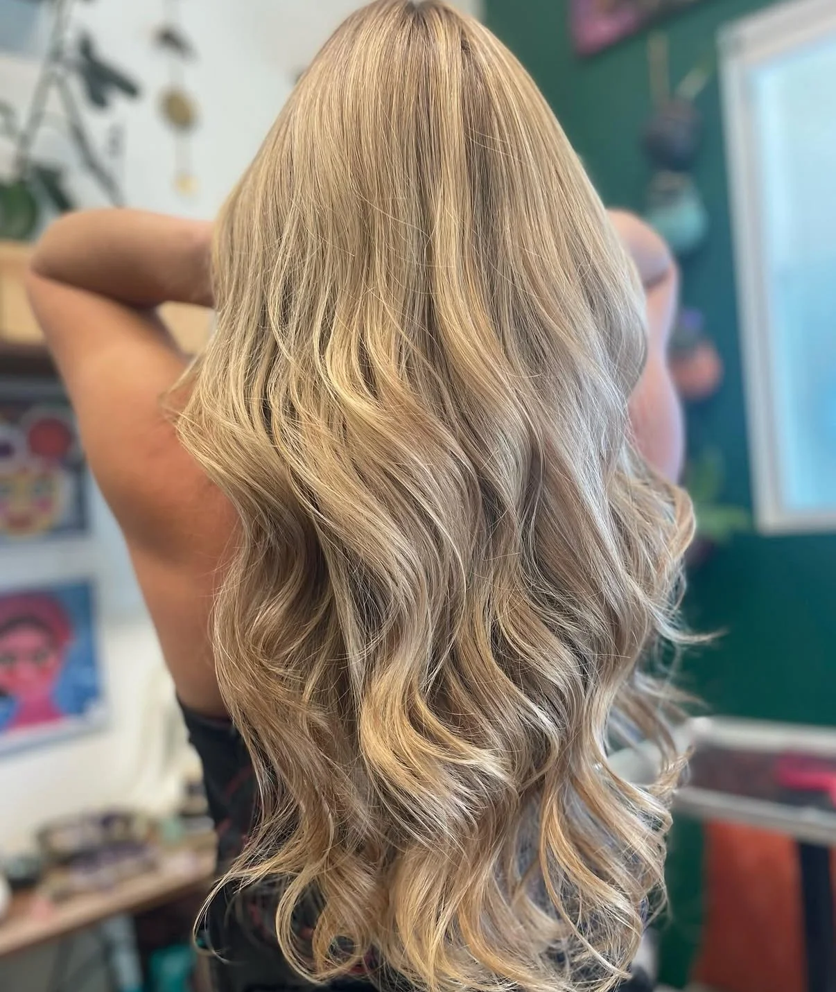 Bright blonde highlights with a glossy, healthy finish at Zen Den Salon in Encinitas.