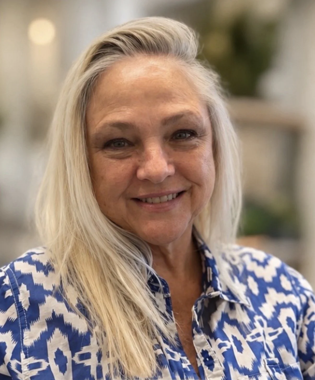 Natural gray blending with soft blonde highlights for a seamless, dimensional finish at Zen Den Salon in Encinitas, CA.