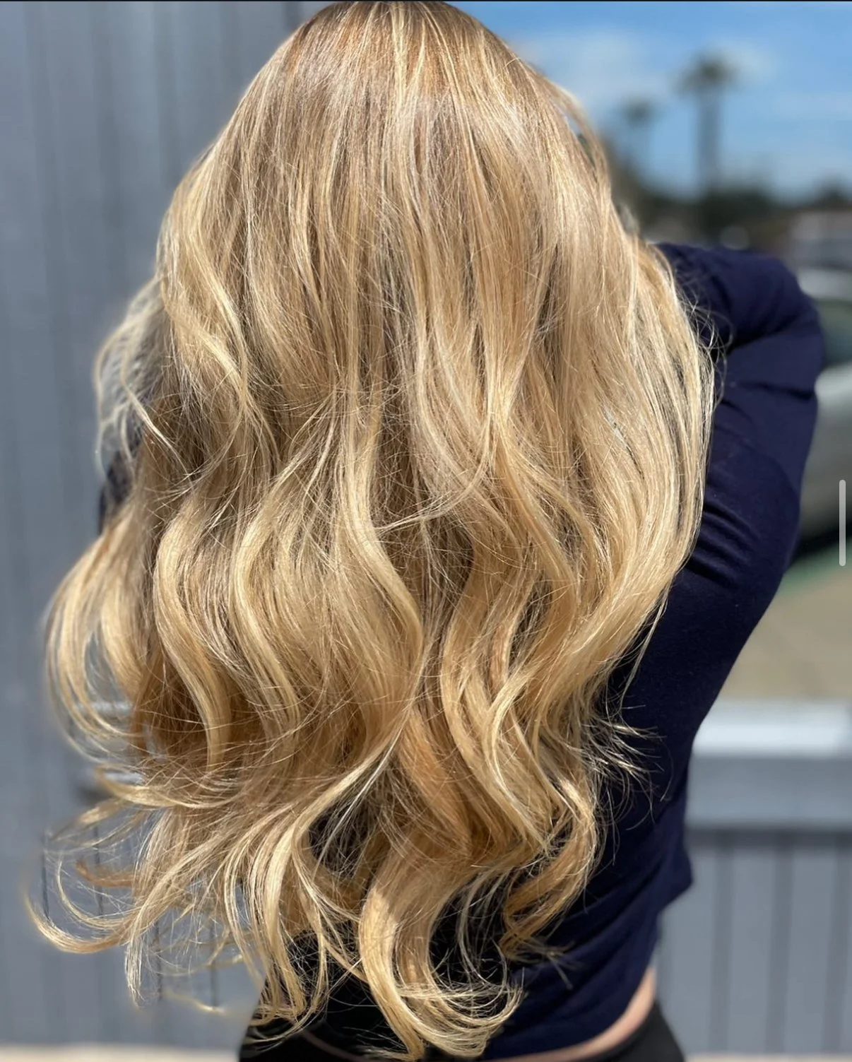 Dimensional blonde highlights and shine-enhancing gloss service at Zen Den Salon Encinitas.