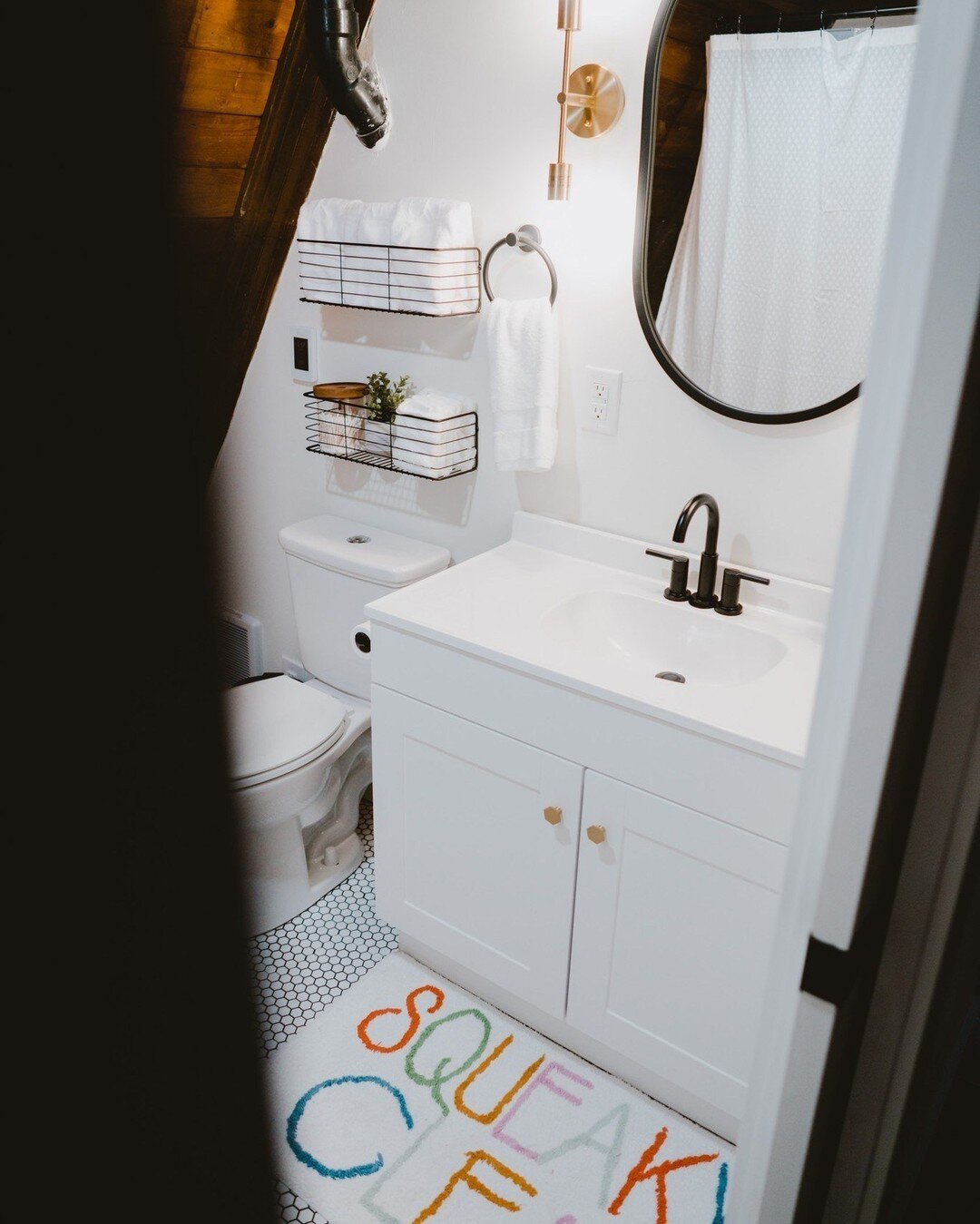 Remodeling an A-frame bathroom always feels like a game of tetris. Challenging and fun! The vanity in this bathroom used to be under the sink, with no mirror, I love how it turned out. What do you think?

Don't forget to click our link in bio to find