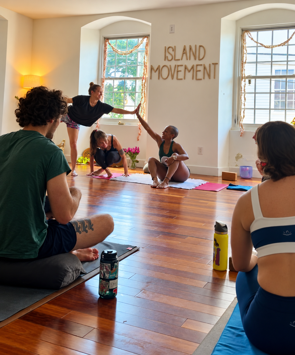 Instructor high fiving a member at the end of a group fitness class at Island Movement in St. Croix