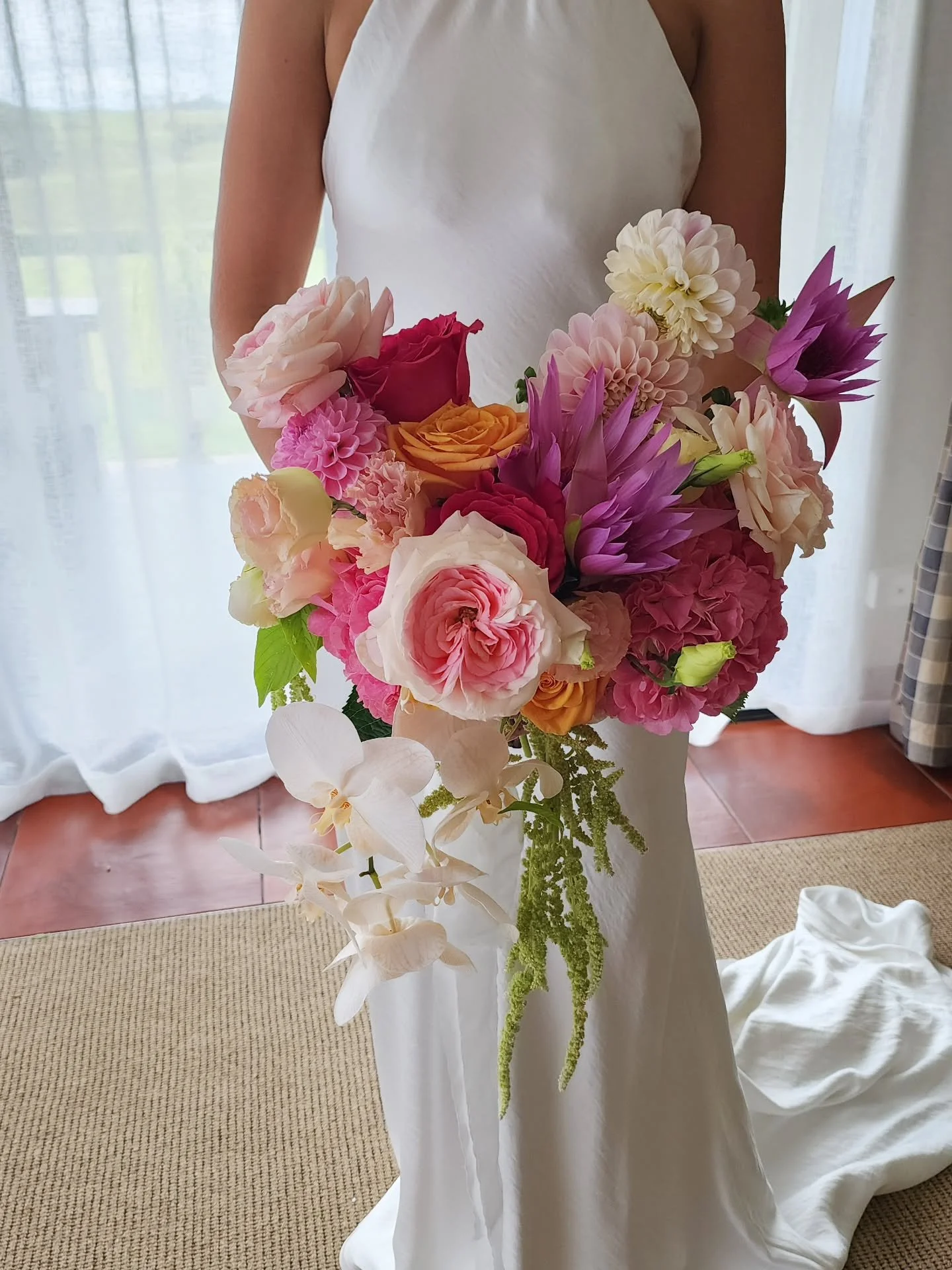 My absolute goal in designing wedding flowers to make them completely custom and specialized to the Bride. 

I'm always thinking outside the box with flower types and colours and how I can make them unforgettable for her. 

Paige's bouquet was defini