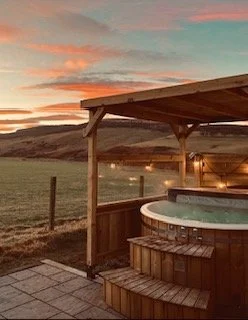 Sunset hot tub at Maycroft.jpg