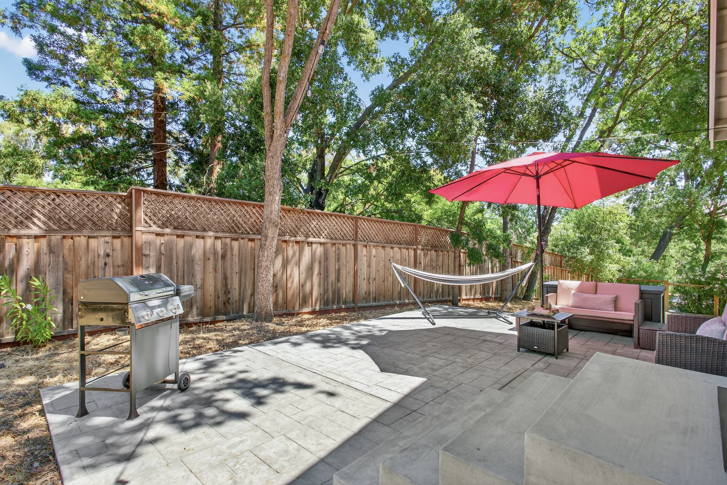 We added this backyard patio and outdoor furniture more than a year after we started renting out the ADU.