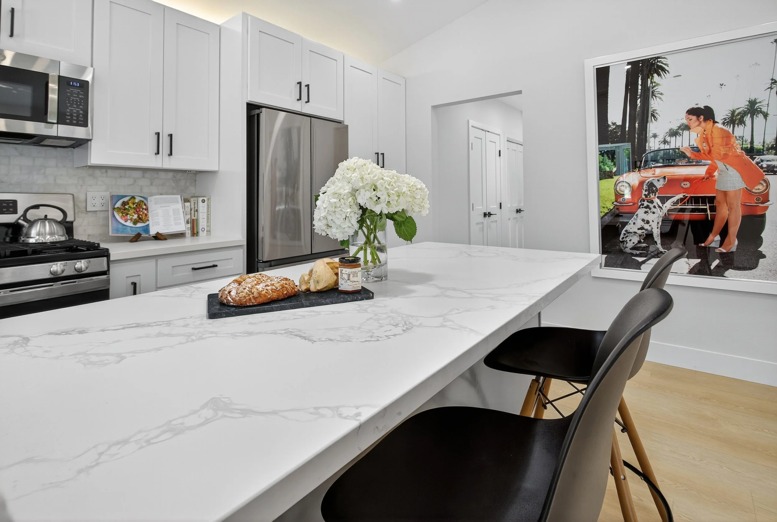 We're big believers in having a "statement piece" to give the design some character. If we were aiming for a short term rental, we would have gone for more of a novel "themed" space, but this felt like the right amount of pizazz for mid term rentals 