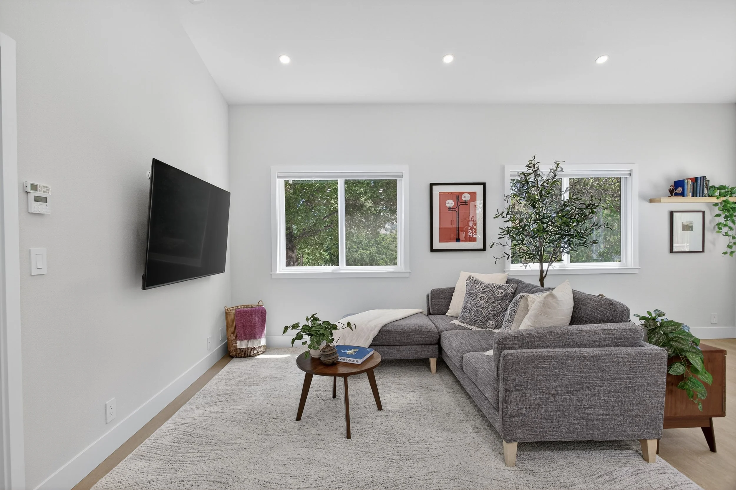 We used the rug to define the space areas, like for the ADU's living room