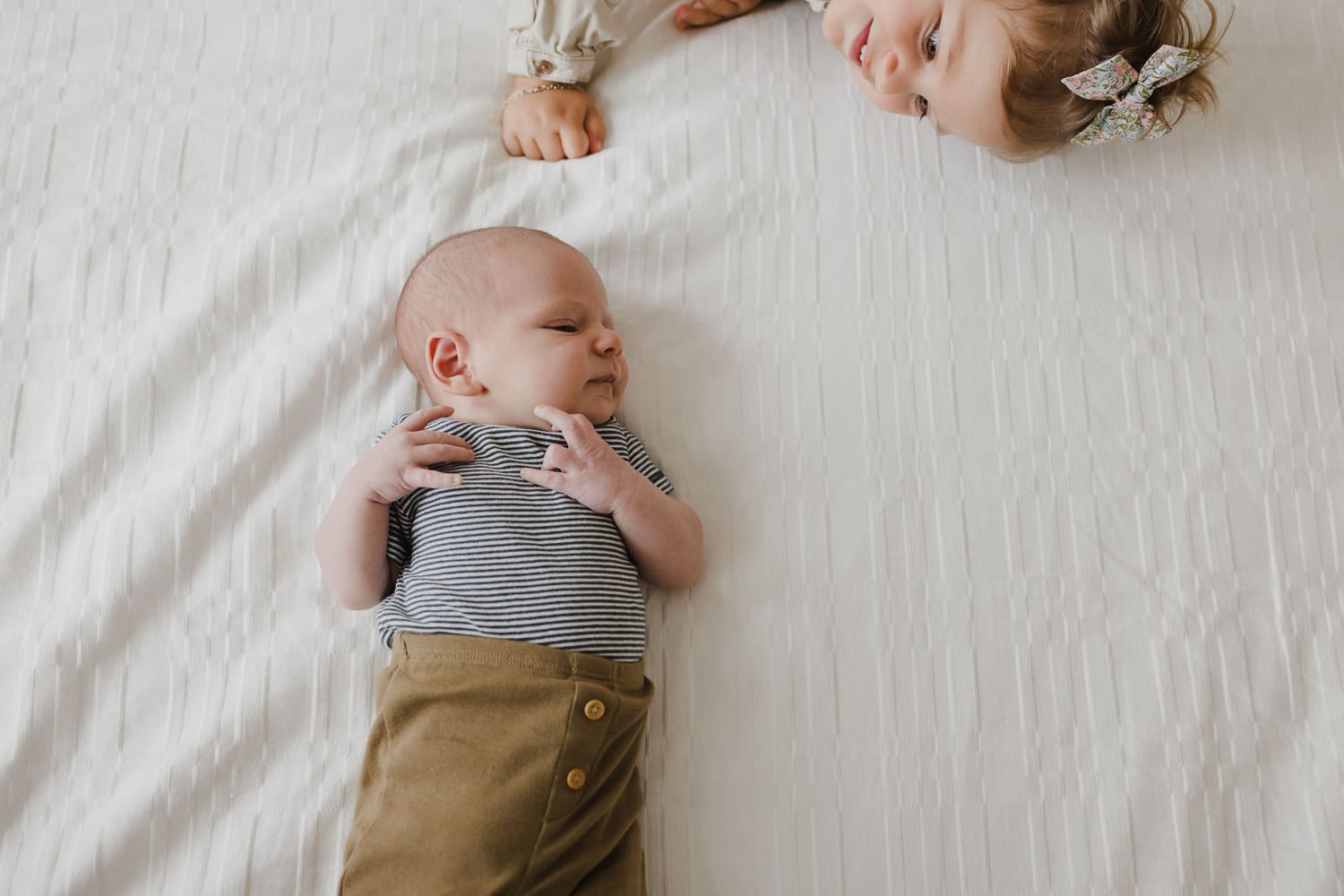 Candid In-Home Family Portraits with toddler and newborn
