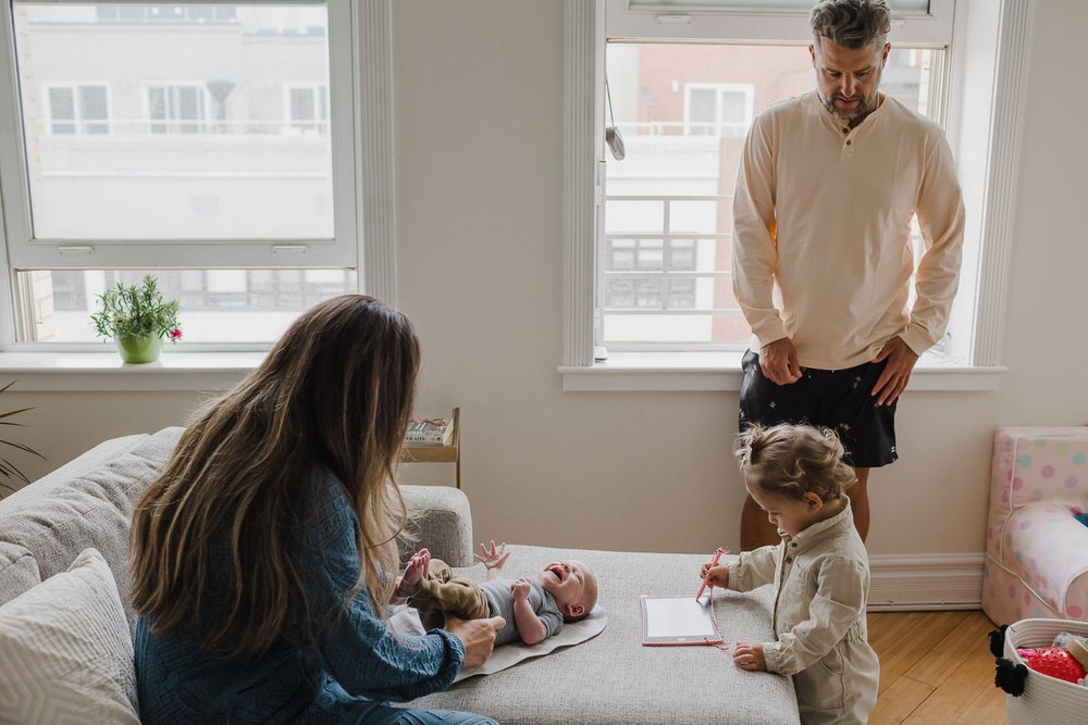 Lifestyle Family Portraits at Home with toddler and newborn