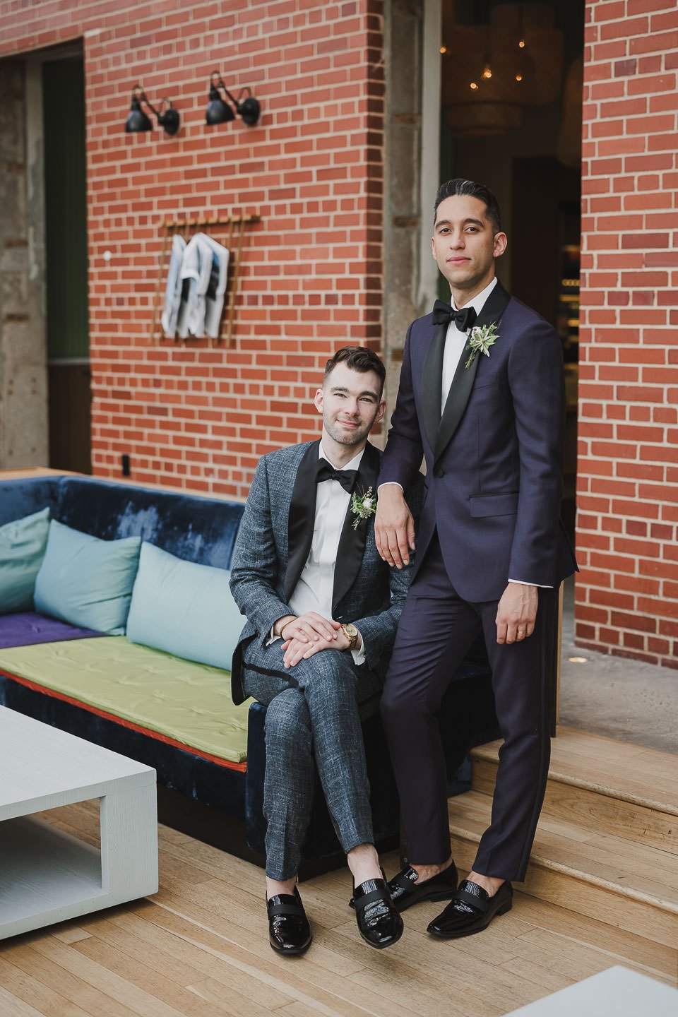 Two grooms wedding photo posing