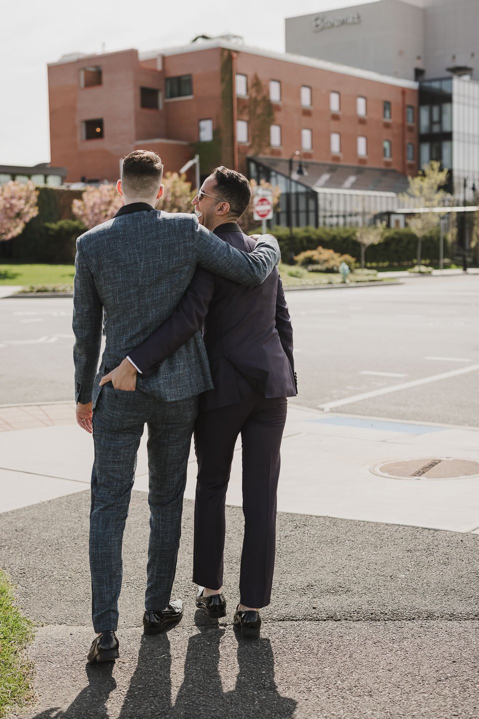 Candid wedding photos with two grooms