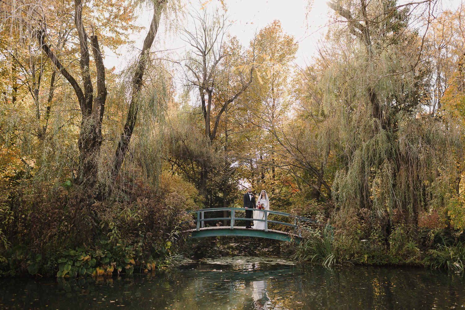 Bride and Groom portraits on Monet Bridge at Grounds For Sculpture