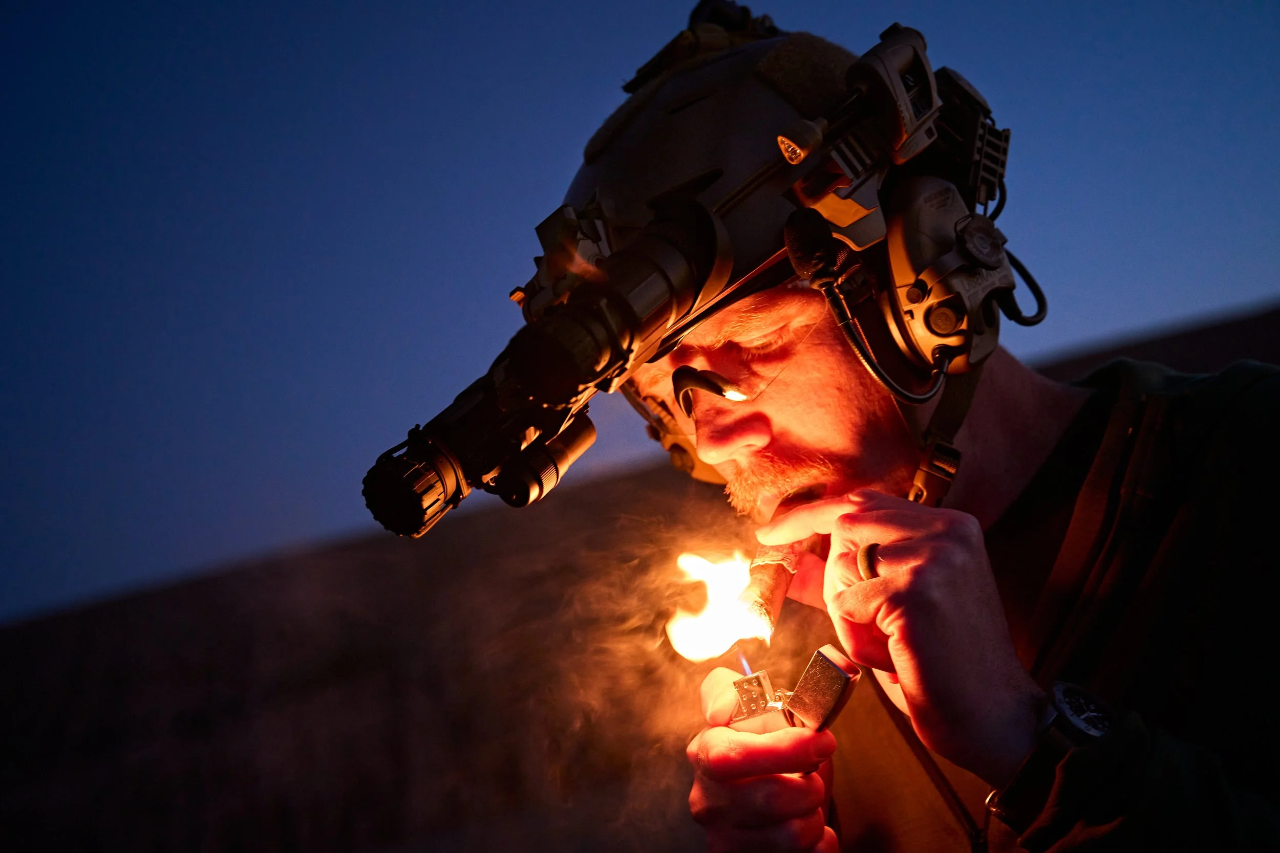 Custom Portrait of model posing BUMP helmet and dual tube night vision lighting a cigar in desert landscape, photo by After Action, LLC #AfterAction