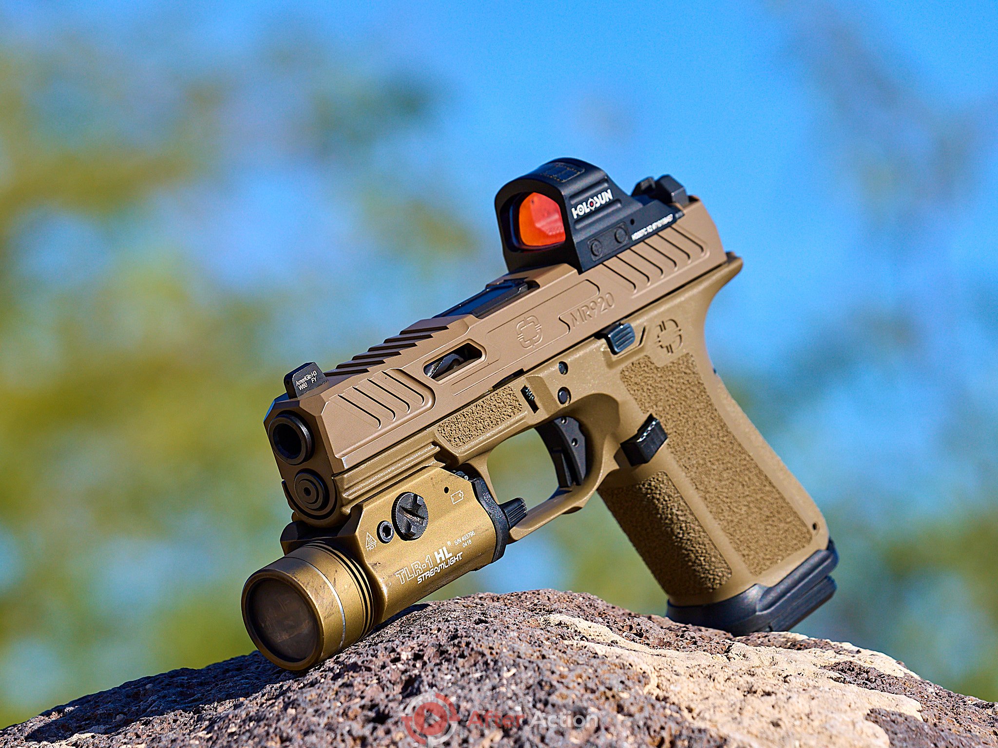 Environmental Product Photo of the Shadow Systems MR920 handgun with Streamlight TLR-1 flashlight and Holosun 507C Reflex Dot Sight sitting on a boulder in the Arizona Desert