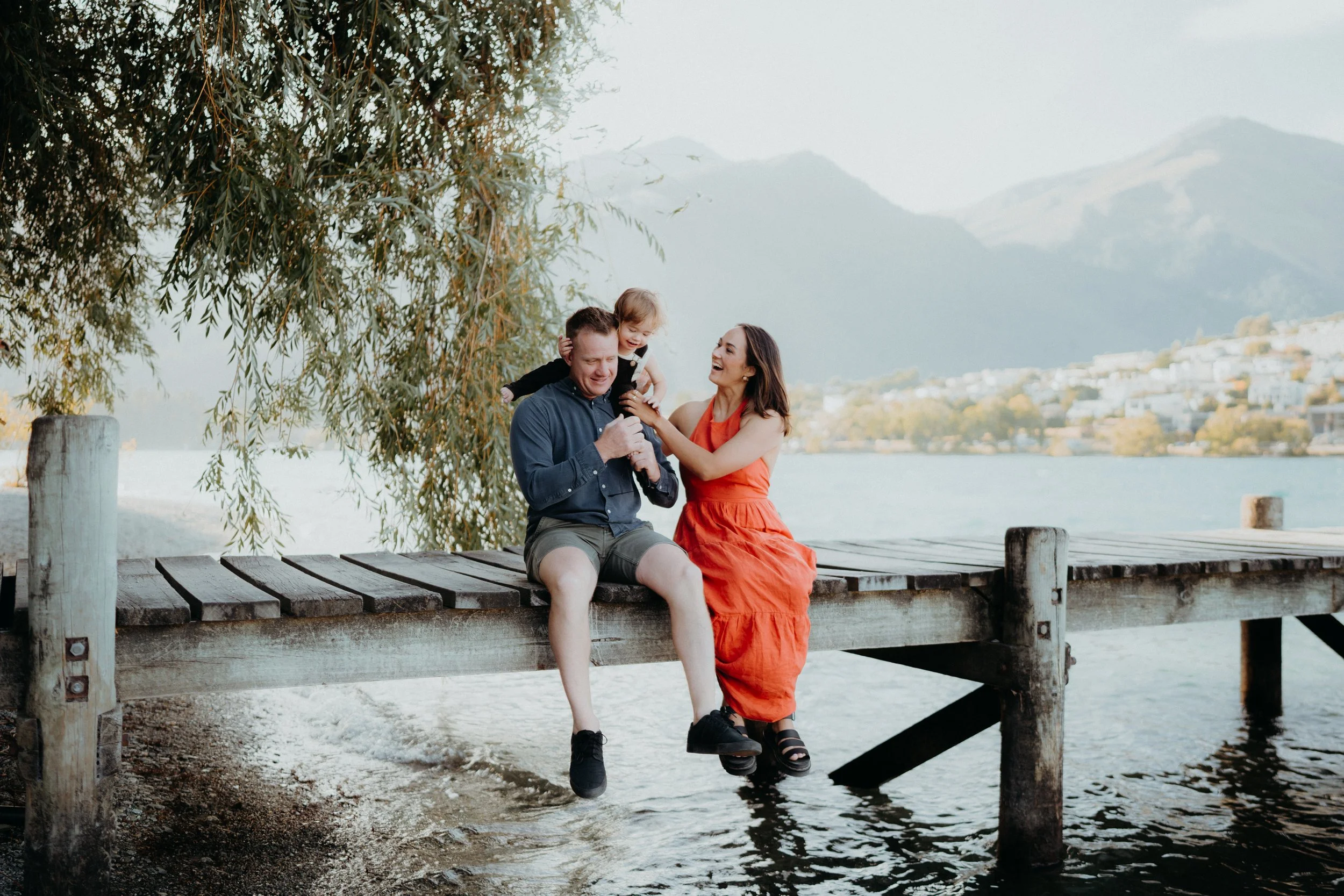 Family sitting on kelvin heights pier