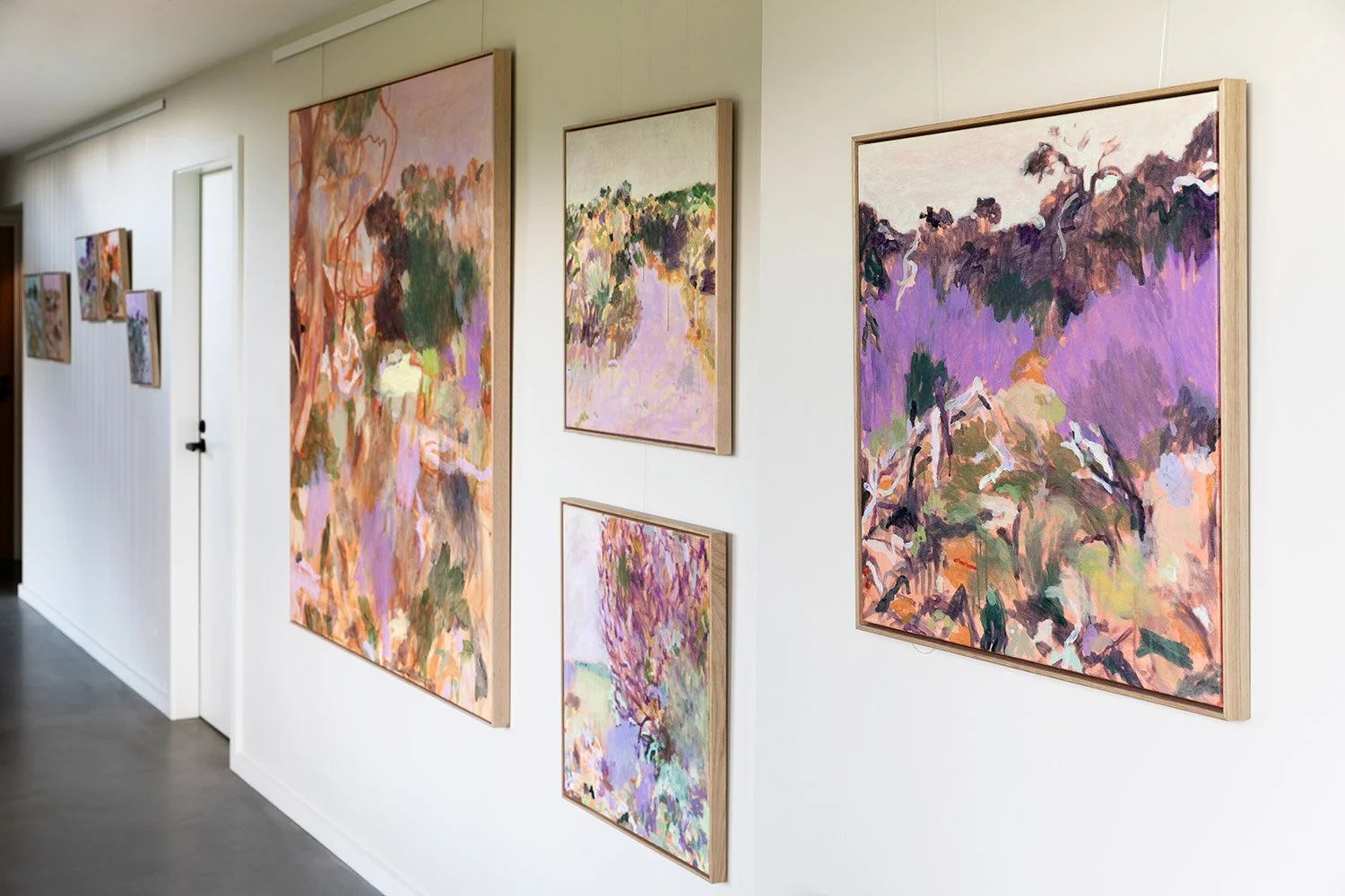 Original abstract landscape painting framed in vic ash hanging on wall in exhibition at lon retreat by Belinda Marshall